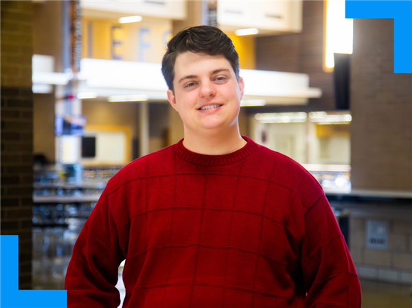  Jacob Holden smiles in the Kickapoo Commons
